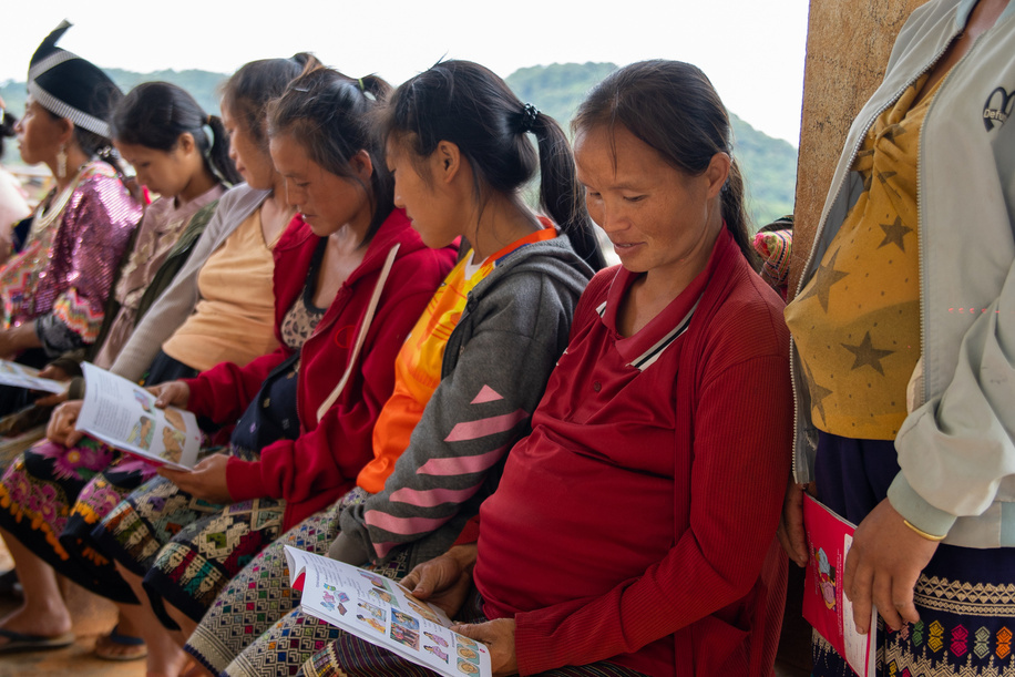 Pregnant women from Hmong community in Khangkhao Village reads a booklet on antenatal care.   Read the feature stories: https://www.who.int/westernpacific/people/pa-vang-laos   https://www.who.int/westernpacific/news-room/feature-stories/item/reaching-the-unreached-in-the-western-pacific Disclaimer: This image was captured during the global response to the COVID-19 pandemic. While the contents of this image might not be directly related to COVID, processes reflect the guidance communicated by local public health authorities at the time of its capture. Please note, public health guidance differs among countries and is indicative of the local context.