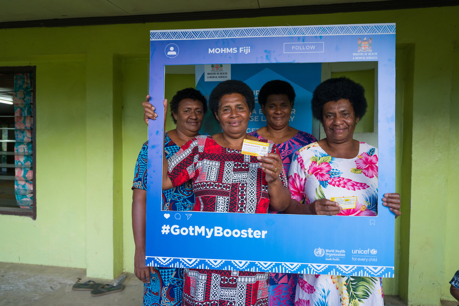 (From left to right) Luisa Sukamanu, Miliana Caviyawa, Mele Tinai, and Mariana Siliva pose for a photo during the COVID-19 vaccination community outreach at Gusuisavu Village in Naitasiri, Fiji. Disclaimer: This image was captured during the global response to the COVID-19 pandemic. The contents of this image reflect the guidance communicated by local public health authorities at the time of its capture. Please note, public health guidance differs among countries and is indicative of the local context.