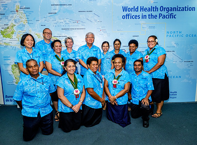 Group photo of Dr Shin Young-soo, WHO Regional Director for the Western Pacific, with the staff of the WHO Representative Office in the South Pacific in Suva. Note: Title reflects the respective position of the subject at the time the photo was taken.