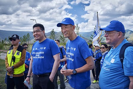 Dr Takeshi Kasai (center), WHO Regional Director for the Western Pacific, joins Dr S. Enkhbold (left), Minister of Health, Mongolia at the Walk the Talk event for the Health for All Challenge held at the National Garden Park in Ulaanbaatar. Note: Title of WHO staff reflects their respective position at the time the photo was taken. Disclaimer: This image was captured during the global response to the COVID-19 pandemic. While the contents of this image might not be directly related to COVID, processes reflect the guidance communicated by local public health authorities at the time of its capture. Please note, public health guidance differs among countries and is indicative of the local context.