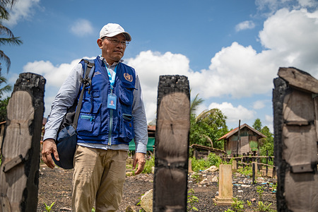 Chan Sophal assesses the fire damage to the house of one of the Village Malaria Workers (VMWs) in Ou Chay Village. Sophal is a WHO field staff for malaria elimination who works on the ground serving vulnerable and hard-to-reach communities. Who’s WHO video series tells the story of WHO workforce and the work they do to promote health, keep the world safe, and serve the vulnerable. In an elimination setting like Cambodia, communities must travel long distances to the nearest centre to access malaria services. The immense dedication of health workers is essential for eliminating malaria in the Greater Mekong subregion by 2030.    Watch https://www.who.int/westernpacific/news-room/multimedia/overview/item/reaching-out-to-remote-communities-to-eliminate-malaria#