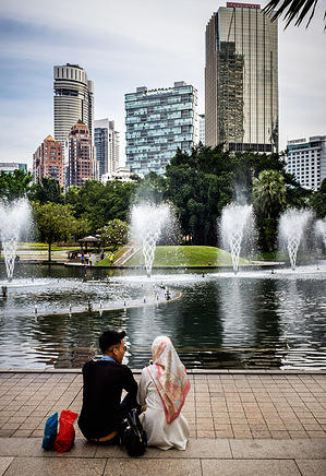 People facing water fountain of KLCC park (Kuala Lumpur City Center) park