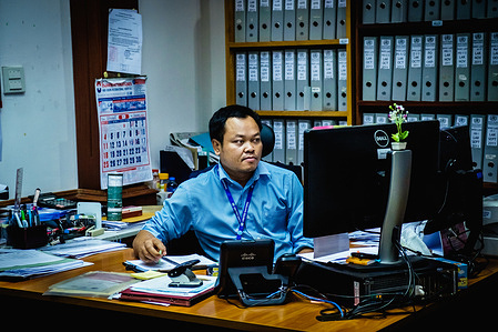 WHO Country Office in the Lao People's Democratic Republic staff in his workstation.