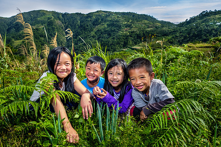 Children smiling and playing in the mountains of Benguet