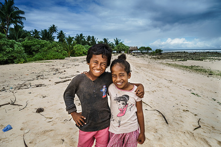 Brother and sister in South Tawara, Kiribati.