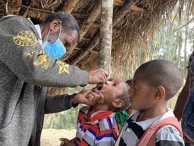Health care workers vaccinate children under five years old for polio, administer vitamin A supplements and distribute deworming tables to implement the 2020 Papua New Guinea national supplementary immunization activities