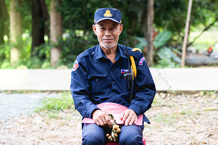 Mr Su Srun works as a security officer in one of the companies in the town and is taking part in the community dialogue.  Community dialogue provides a platform for promoting awareness of preparedness for and response to COVID-19 and beyond, including enhancing community-based surveillance for COVID-19, influenza, and other respiratory pathogens. The activity led by village leaders and volunteers from the nine priority provinces of Cambodia, is an integral part of and built on experience from on-going WHO-supported community engagement strengthening projects.   Read the photo story: https://www.who.int/westernpacific/news-room/photo-story/photo-story-detail/in-cambodia--community-conversations-help-protect-against-covid-19-and-more Disclaimer: This image was captured during the global response to the COVID-19 pandemic. The contents of this image reflect the guidance communicated by local public health authorities at the time of its capture. Please note, public health guidance differs among countries and is indicative of the local context.