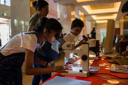 Year 9 student Avanti looks through the microscope to identify the different types of mosquitoes during the World Mosquito Day event. Disclaimer: This image was captured during the global response to the COVID-19 pandemic. While the contents of this image might not be directly related to COVID, processes reflect the guidance communicated by local public health authorities at the time of its capture. Please note, public health guidance differs among countries and is indicative of the local context.