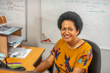 Udila Tawake, Divisional Nurse Coordinator, at her desk at the Ministry of Health in Suva, Fiji. Since 2016, Cure Kids has worked in collaboration with the Ministry of Health and Medical Services to enable sustainable access to oxygen at healthcare centres around Fiji to manage hypoxaemia in children with pneumonia and other serious respiratory conditions. WHO has worked with the Ministry of Health in Fiji as well as medical teams from the University of Auckland to address the challenge of improving the availability and affordability of oxygen to treat patients in Fiji. The Fiji Oxygen Project has introduced new technology, including solar power, to ensure the supply of oxygen in low resource settings.   Read more: https://www.who.int/westernpacific/news-room/feature-stories/item/innovation-for-health--oxygen-access-in-fiji Watch https://www.youtube.com/watch?v=jq7HMlV90oc Note: Title reflects the respective position of the subject at the time the photo was taken.
