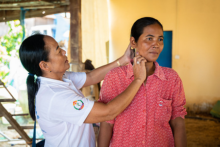 A health worker conducts a physical examination for signs of leprosy. In Cambodia, WHO supports the Ministry of Health’s National Leprosy Elimination Program (NLEP) with the implementation of activities aimed at addressing stigma and discrimination experienced by people affected by leprosy.    Read more: https://www.who.int/westernpacific/news-room/feature-stories/item/caring-for-communities--a-tailored-approach-to-leprosy-elimination-in-cambodia Watch https://www.youtube.com/watch?v=DesgSkXbDcw&t=10s