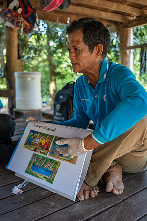 Ai Mai, a village malaria worker, educates villagers about malaria prevention at Ou Chan Tong Village. Who’s WHO video series tells the story of WHO workforce and the work they do to promote health, keep the world safe, and serve the vulnerable. In an elimination setting like Cambodia, communities must travel long distances to the nearest centre to access malaria services. The immense dedication of health workers are essential for eliminating malaria in the Greater Mekong subregion by 2030.    Watch https://www.who.int/westernpacific/news-room/multimedia/overview/item/reaching-out-to-remote-communities-to-eliminate-malaria#