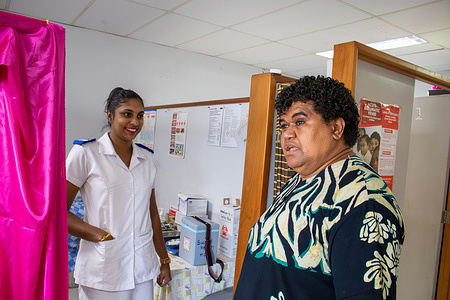 Sister Litiana Volavola (right), Programme Manager for Immunization at Fiji’s Ministry of Health and Medical and Services, talks with Nurse Shivanjali (left) about COVID-19 vaccines available at the Suva Health Clinic. Fiji's Ministry of Health and Medical Services has been working on integrating COVID-19 vaccines into routine health service delivery. Fiji continues to provide access to these life-saving vaccines, centralizing them in key locations across the country: Suva Health Clinic for the Central Division, Nadi Sarda Clinic for the Western Division, and Labasa Maternal and Child Health Clinic for the Northern Division.   Read more: https://www.who.int/tuvalu/news/feature-stories/item/safeguarding-communities-against-vaccine-preventable-diseases-in-fiji