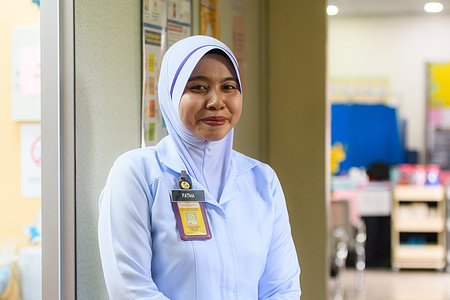 Fatma, one of the midwives serving in Broga, Malaysia. Universal health coverage (UHC) is a vision where all people and communities have access to quality health services where and when they need them, without suffering financial hardship. Based on a strong primary health care system, it includes the full spectrum of health services required throughout life, but also prioritizes keeping healthy patients healthy.    Read more: https://www.who.int/westernpacific/news-room/feature-stories/item/affordable--accessible-health-care-gets-results--financial-protection-and-people-centred-care-in-malaysia Watch: https://www.youtube.com/watch?v=_QIZ8zdn9Wk